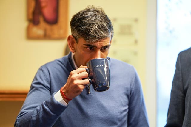 <p>Rishi Sunak enjoying a cup of tea  </p>