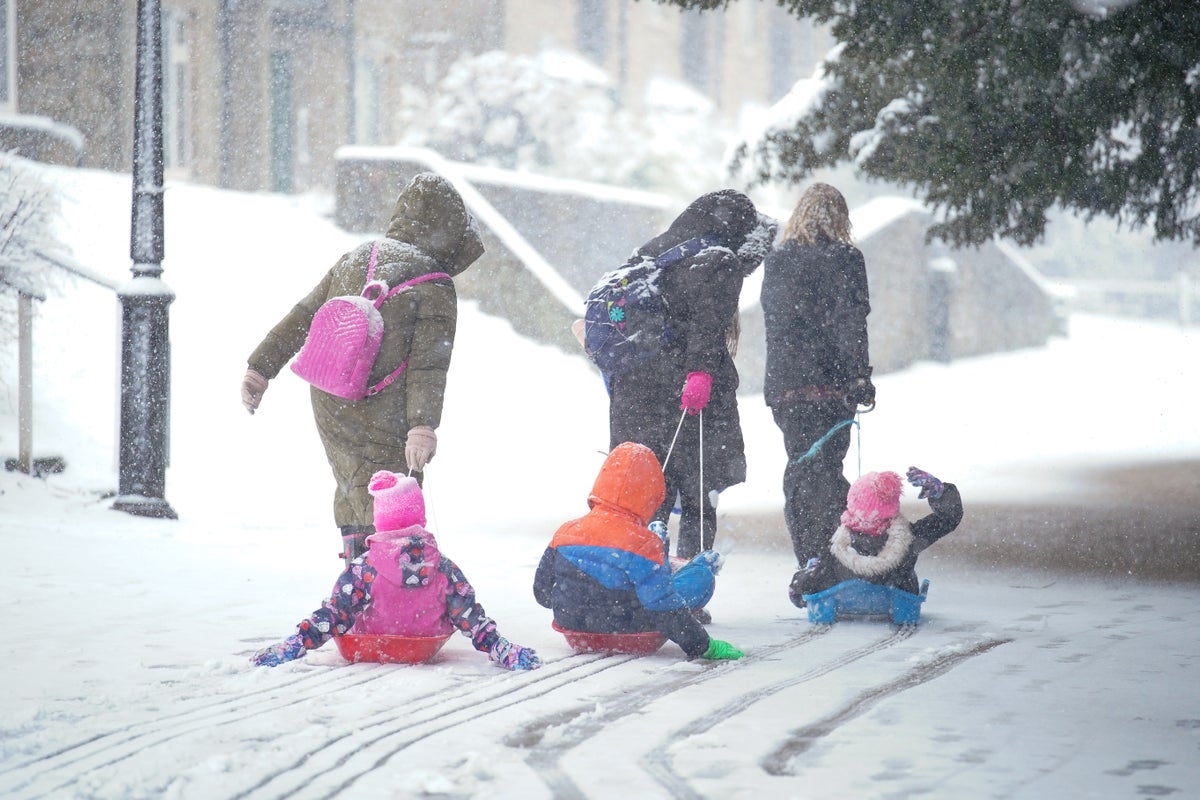 Britain braced for more snow and ice after dozens of schools forced to ...
