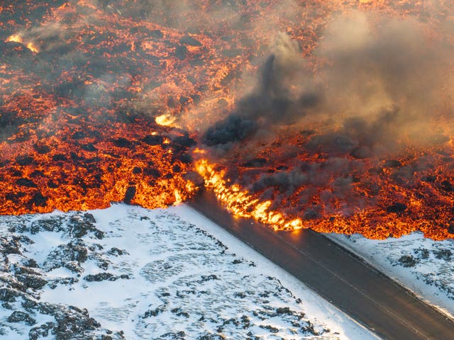 <p>Lava spilling onto a main road leading to Grindavik  </p>