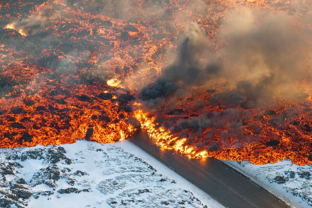 <p>Lava spilling onto a main road leading to Grindavik  </p>