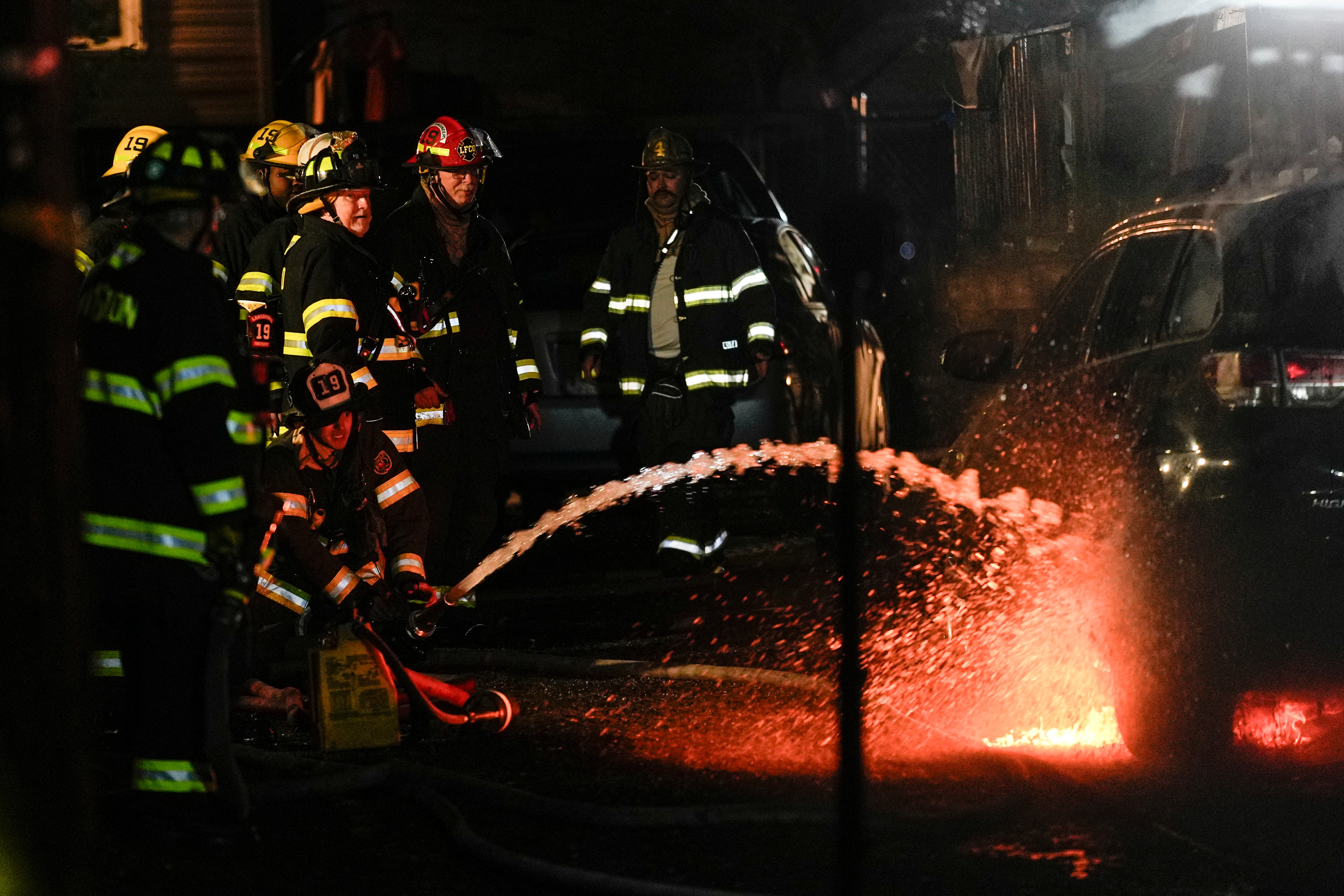 APTOPIX Officers Wounded House Fire