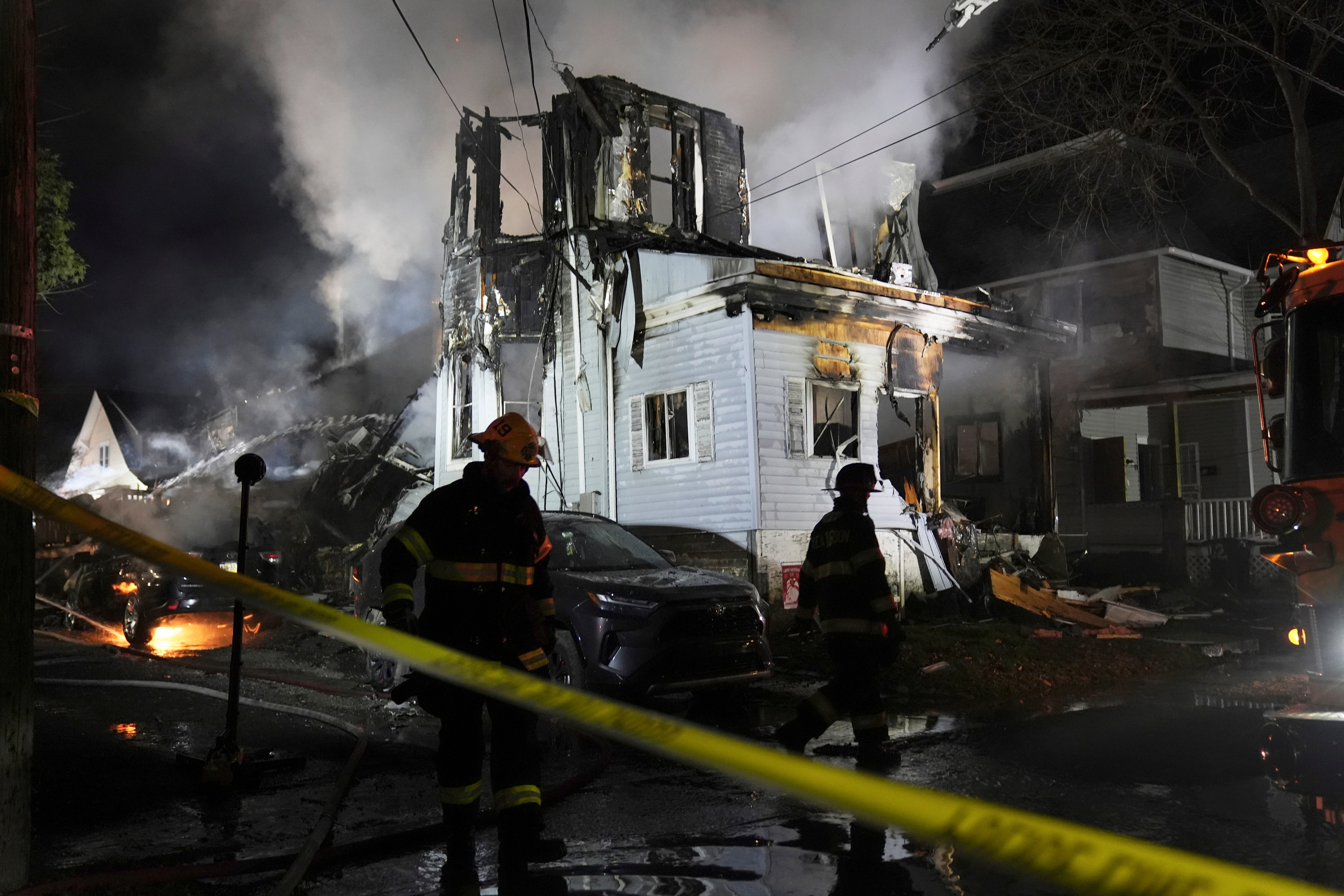 APTOPIX Officers Wounded House Fire