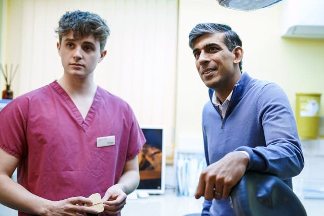 <p>Prime Minister Rishi Sunak talking to staff during a visit to Gentle Dental in Cornwall.  </p>