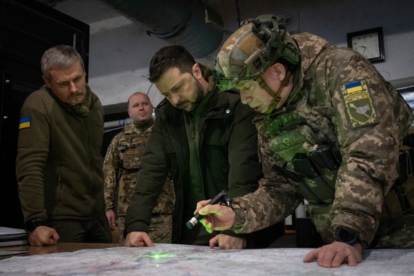 Zelensky with his new commander-in-chief Oleksandr Syrksy (right) 