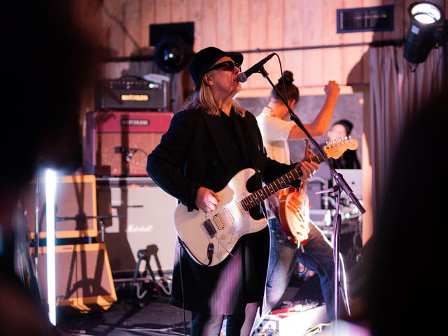 <p>Taylor playing a benefit concert for the Cancer Awareness Trust in October 2023</p>