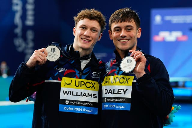 Noah Williams, left, and Tom Daley secured silver at the World Aquatic Championships (Hassan Ammar/AP)