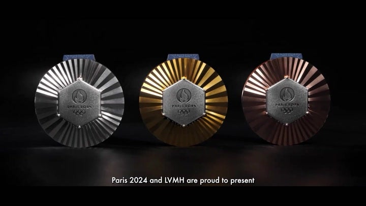 First Look At Paris 2024 Olympic Medals Embedded With Pieces Of Eiffel