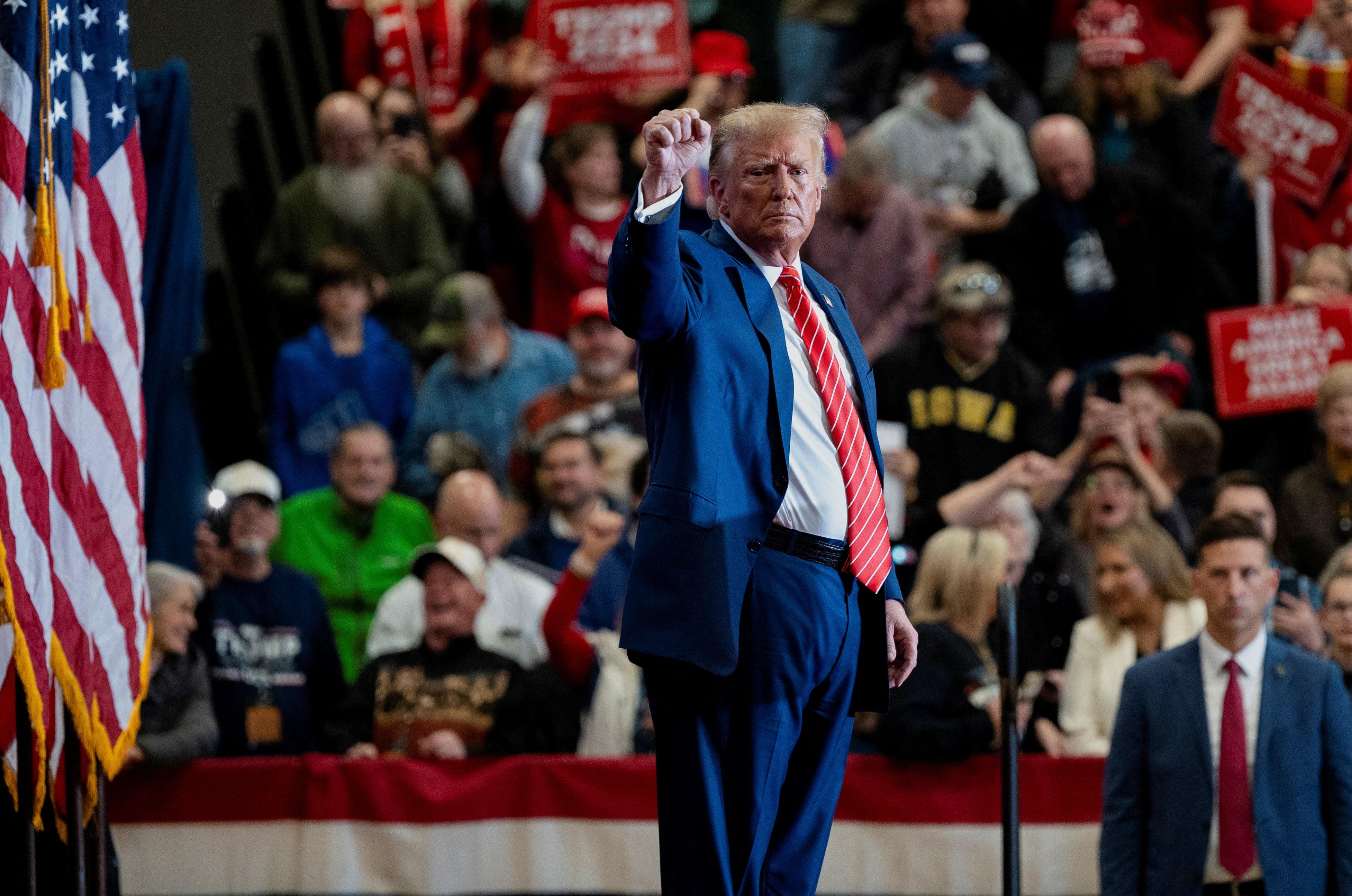 <p>Donald Trump gestures at a campaign rally </p>