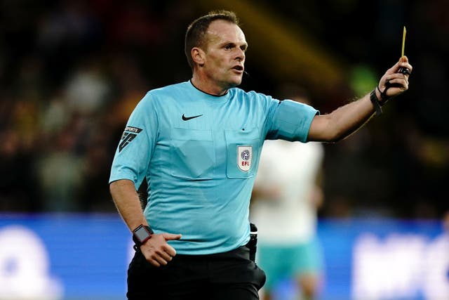 Referees, like Geoff Eltringham, pictured, could soon be showing blue cards (Aaron Chown/PA)