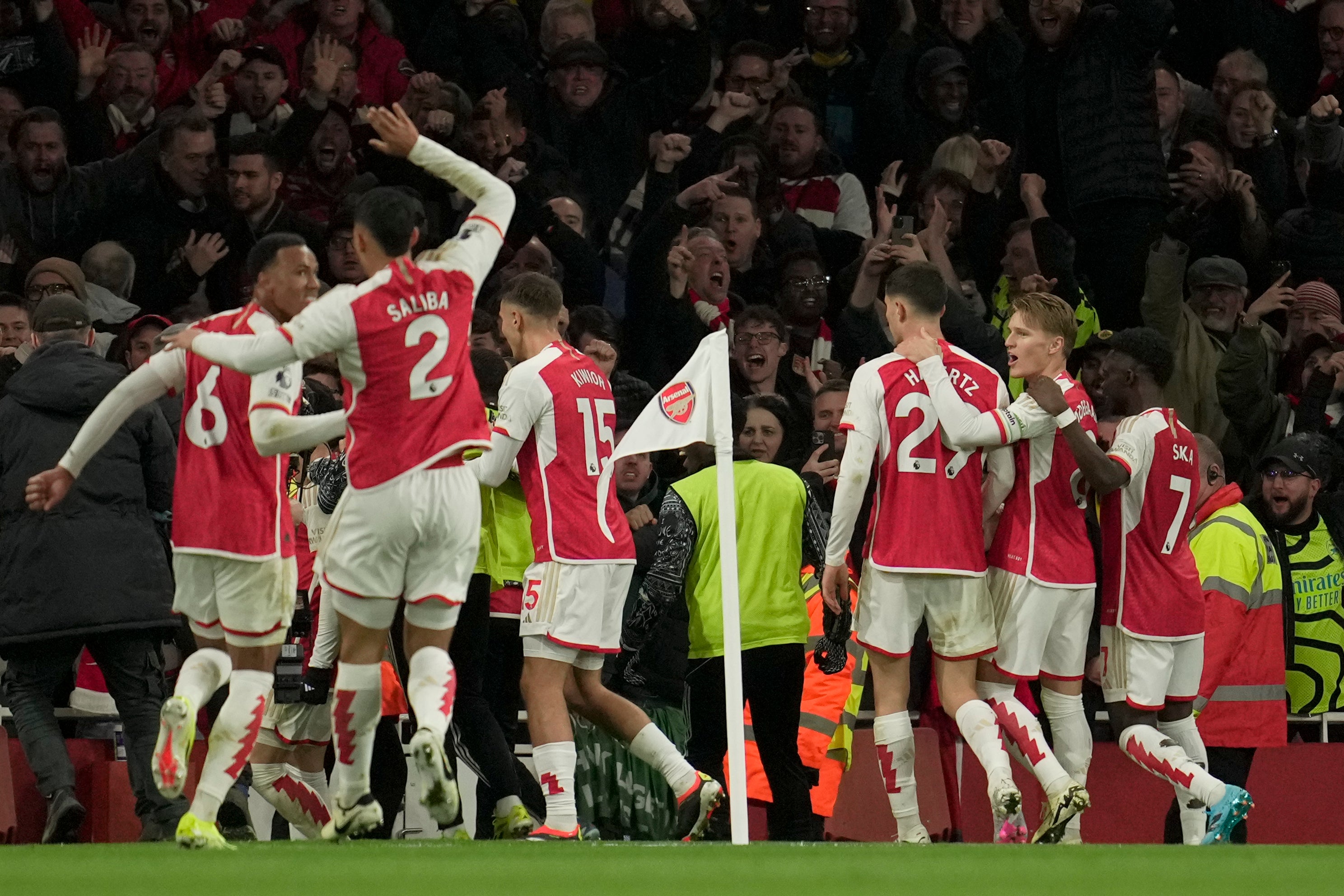 Arsenal celebrate after scoring against Liverpool