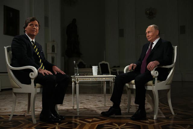 <p>In this pool photograph distributed by Russian state agency Sputnik, Russia's President Vladimir Putin gives an interview to US talk show host Tucker Carlson at the Kremlin in Moscow on February 6, 2024</p>