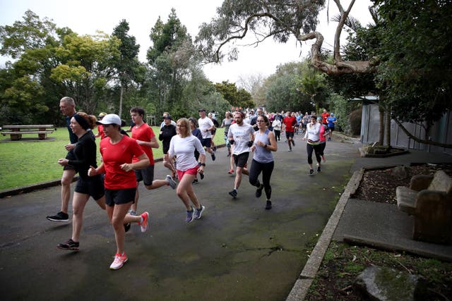 <p>People running the 5km Parkrun held every Saturday morning in the UK and around the world</p>