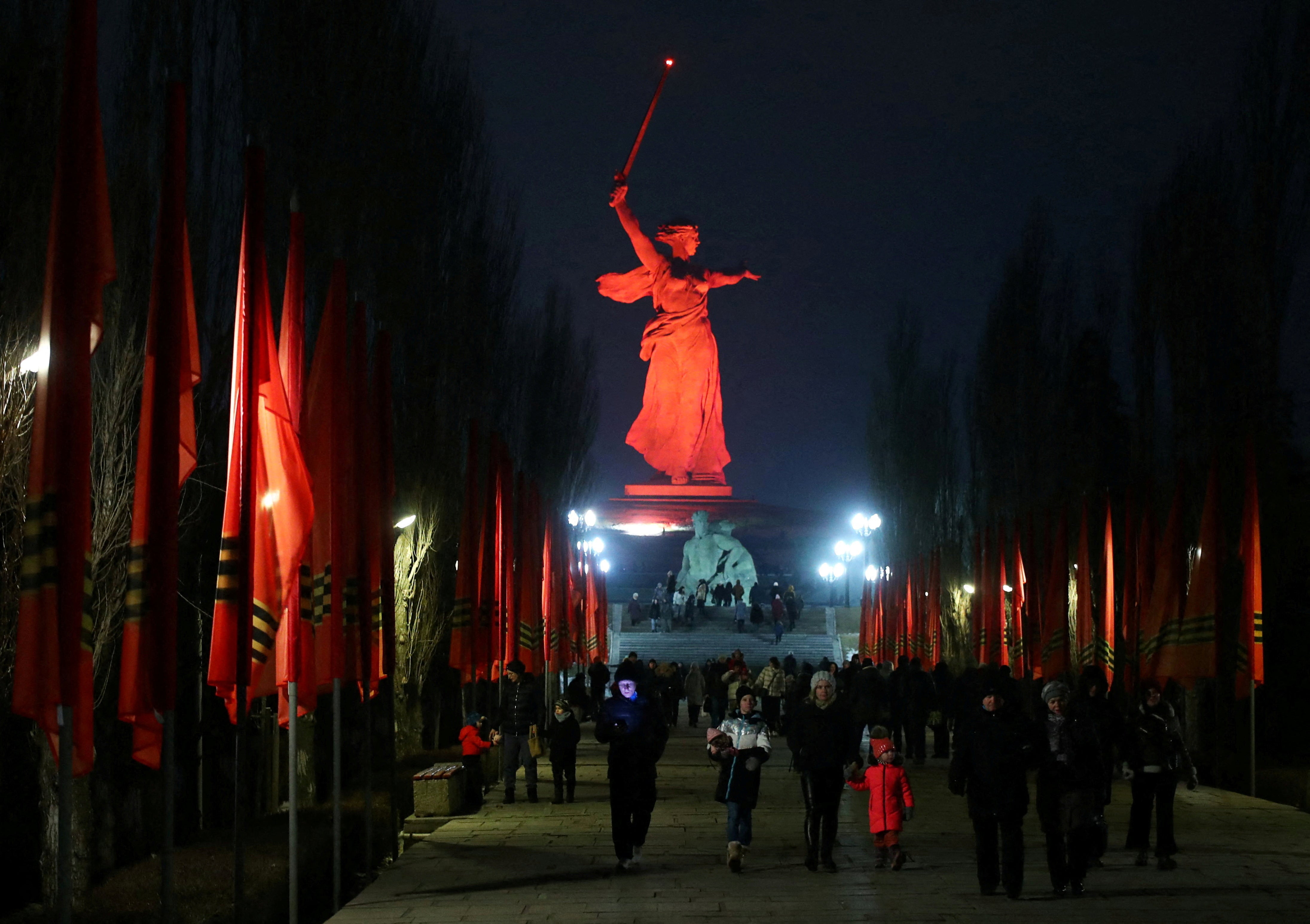 ‘The Motherland Calls’ monument is illuminated in red during a ceremony to mark the 80th anniversary of Soviet victory