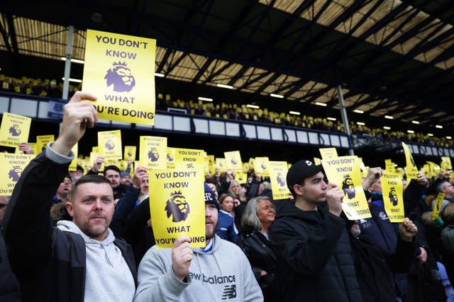<p>Everton fans protested against their ten-point deduction, which has been reduced to six </p>