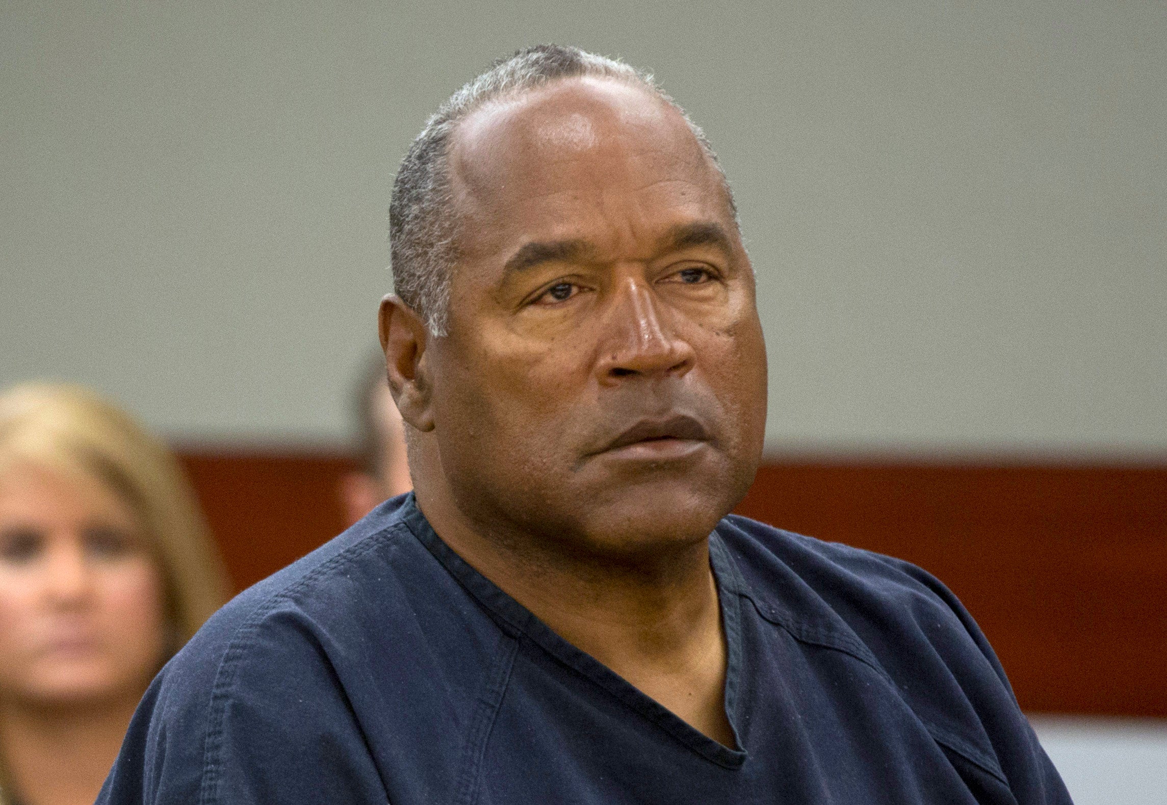 O.J. Simpson listens to audio recording played during an evidentiary hearing for O.J. Simpson in Clark County District Court in Clark County District Court May 16, 2013