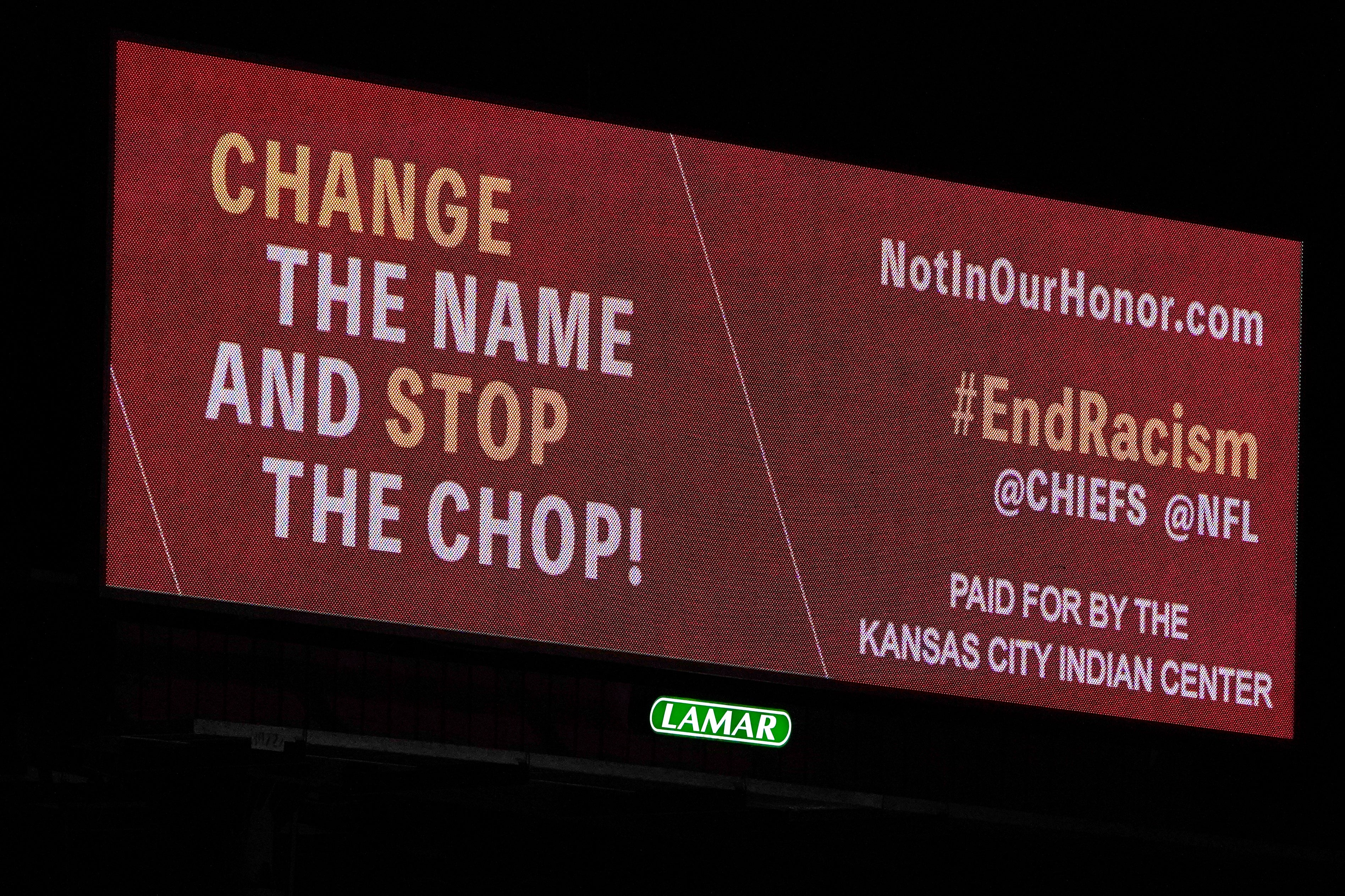 A billboard calling for a name change and an end to the Kansas City Chiefs ‘chop’ stands