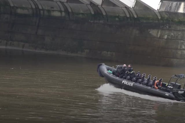 <p>Police boats search Thames near Chelsea Bridge for alkali attack suspect Abdul Ezedi</p>