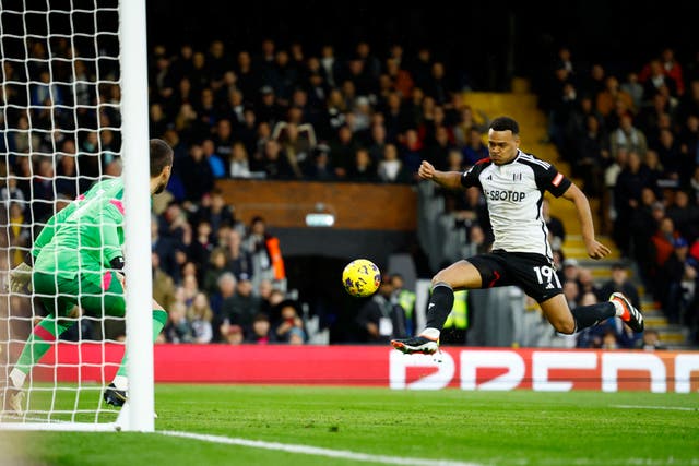 <p>Fulham's Rodrigo Muniz scores their third goal past</p>