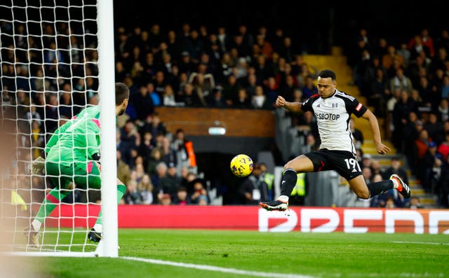 <p>Fulham's Rodrigo Muniz scores their third goal past</p>