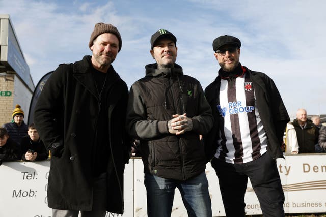 Keith Duffy and Shane Lynch of Boyzone with Brian McFadden of Westlife ahead of the FA Trophy fifth round match at Victory Park, Chorley (Nigel French/PA)