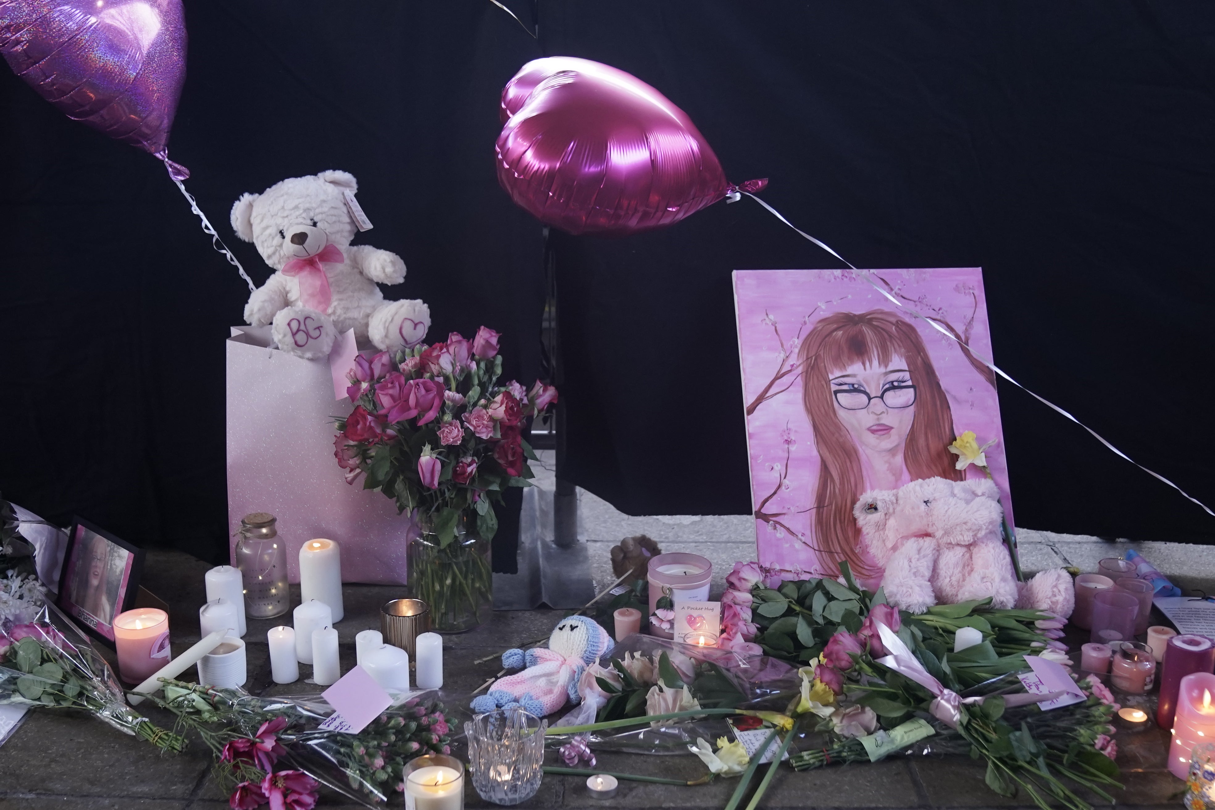 Tributes left during a vigil in Golden Square