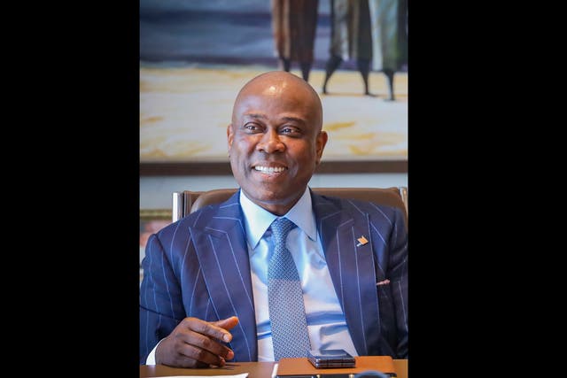 <p>Herbert Wigwe, CEO of Access Bank, in his Lagos, Nigeria office. Mr Wigwe, his wife and son were killed in a helicopter crash on Friday(AP Foto/Ayodeji Owolabi)</p>