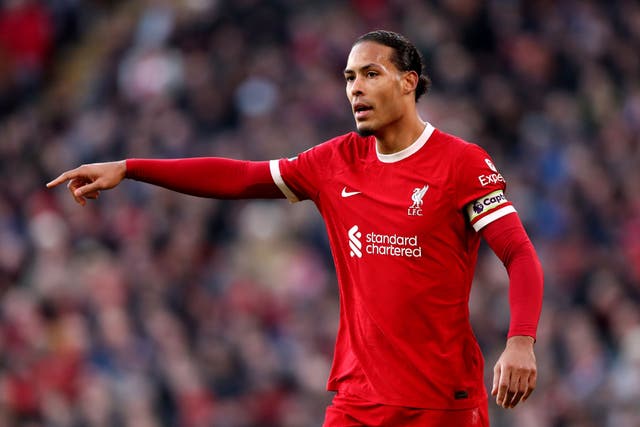 Liverpool captain Virgil van Dijk intends to enjoy the ride of the Premier League title race with Manchester City (Tim Markland/PA)