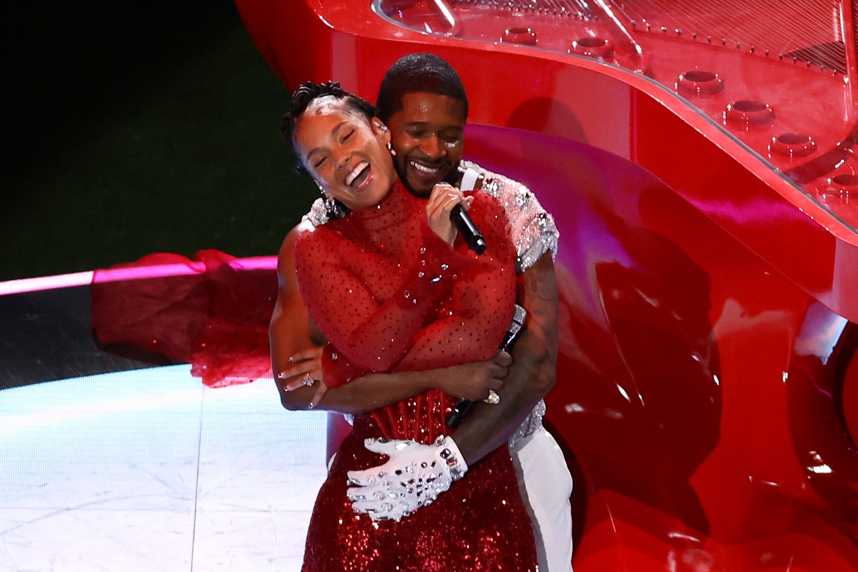 Usher and Alicia Keys perform onstage during the Apple Music Super Bowl LVIII Halftime Show at Allegiant Stadium