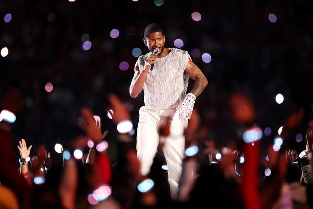 <p>Usher performing during the 2024 Super Bowl halftime show </p>