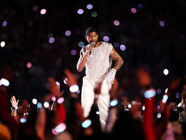 <p>Usher performing during the 2024 Super Bowl halftime show </p>