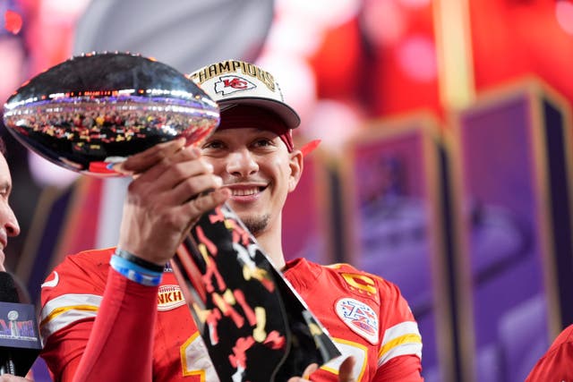 Kansas City Chiefs quarterback Patrick Mahomes holds the Vince Lombardi Trophy after the NFL Super Bowl 58 football game against the San Francisco 49ers (Ashley Landis/AP)