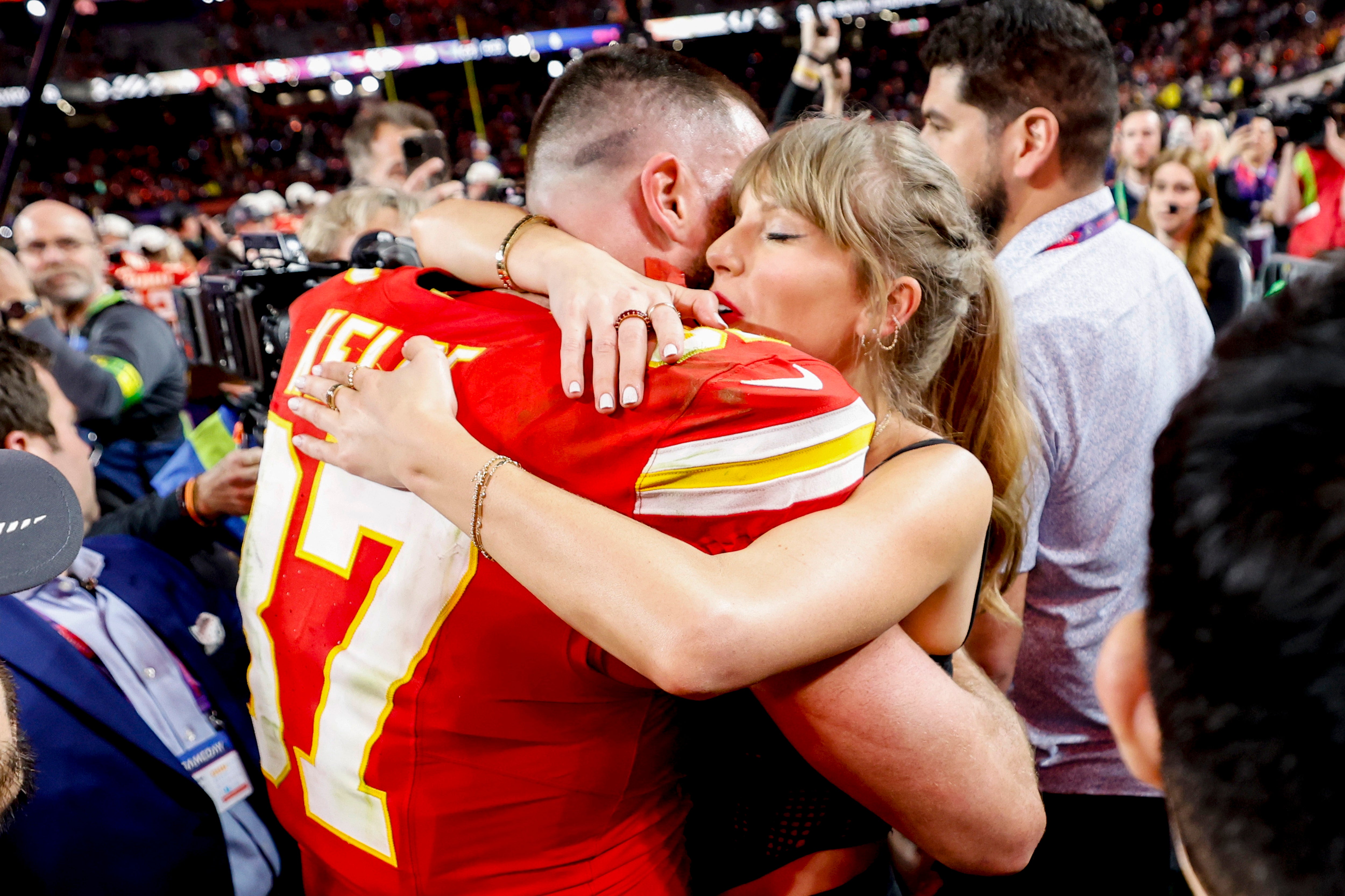 Travis Kelce and Taylor Swift embrace after the Super Bowl