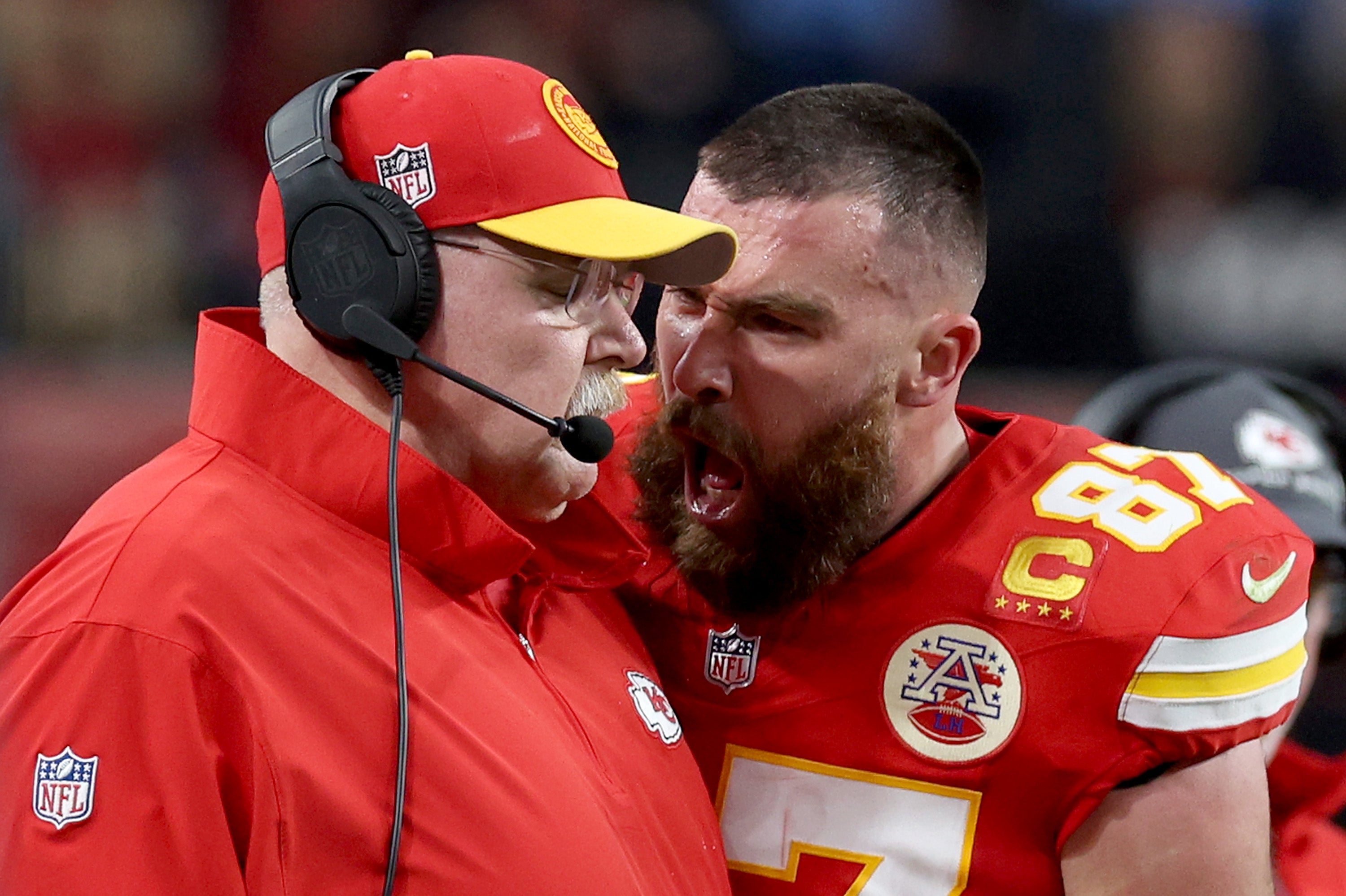 Kelce yells into the face of his coach, Andy Reid