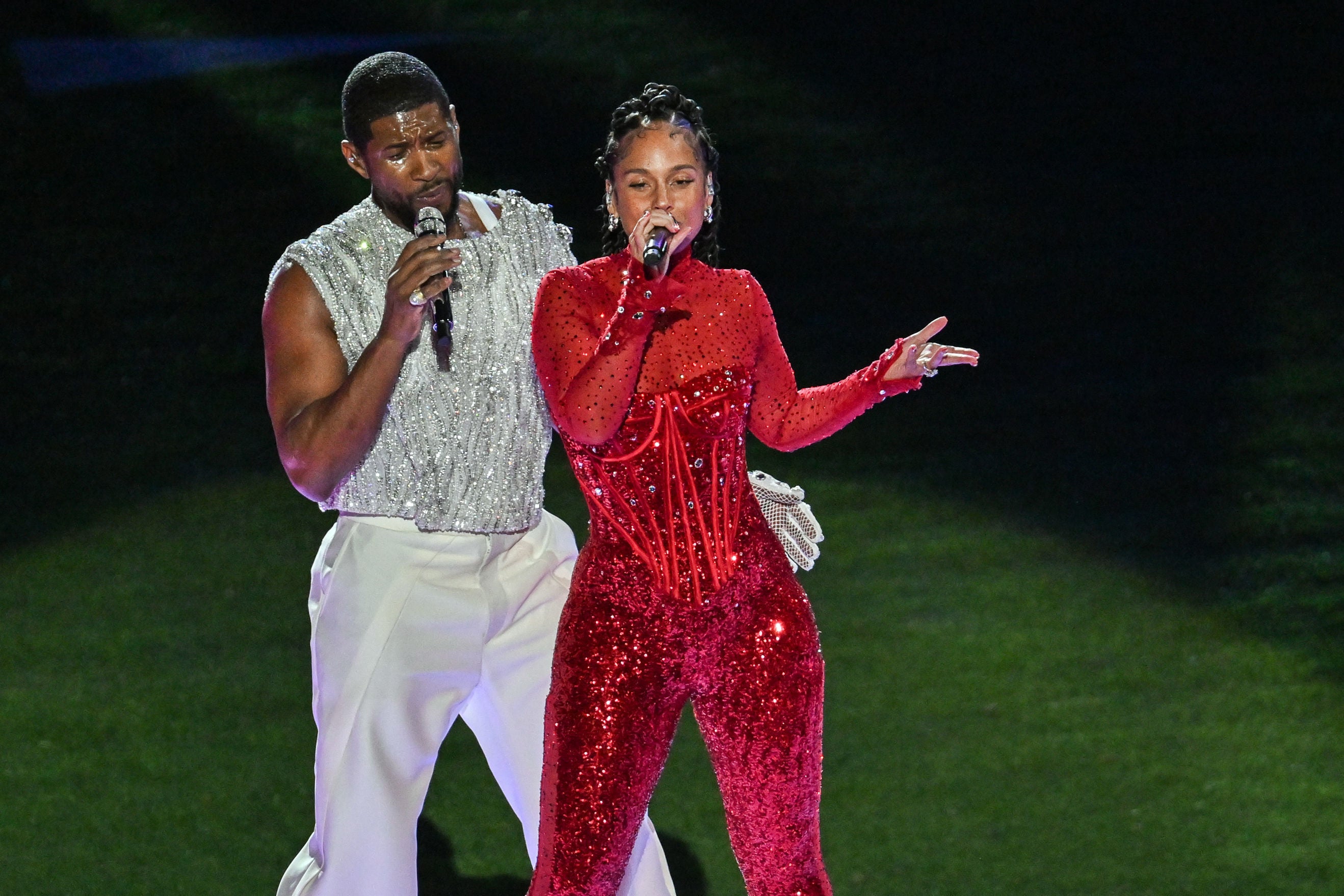 Usher performs with Alicia Keys at the Super Bowl