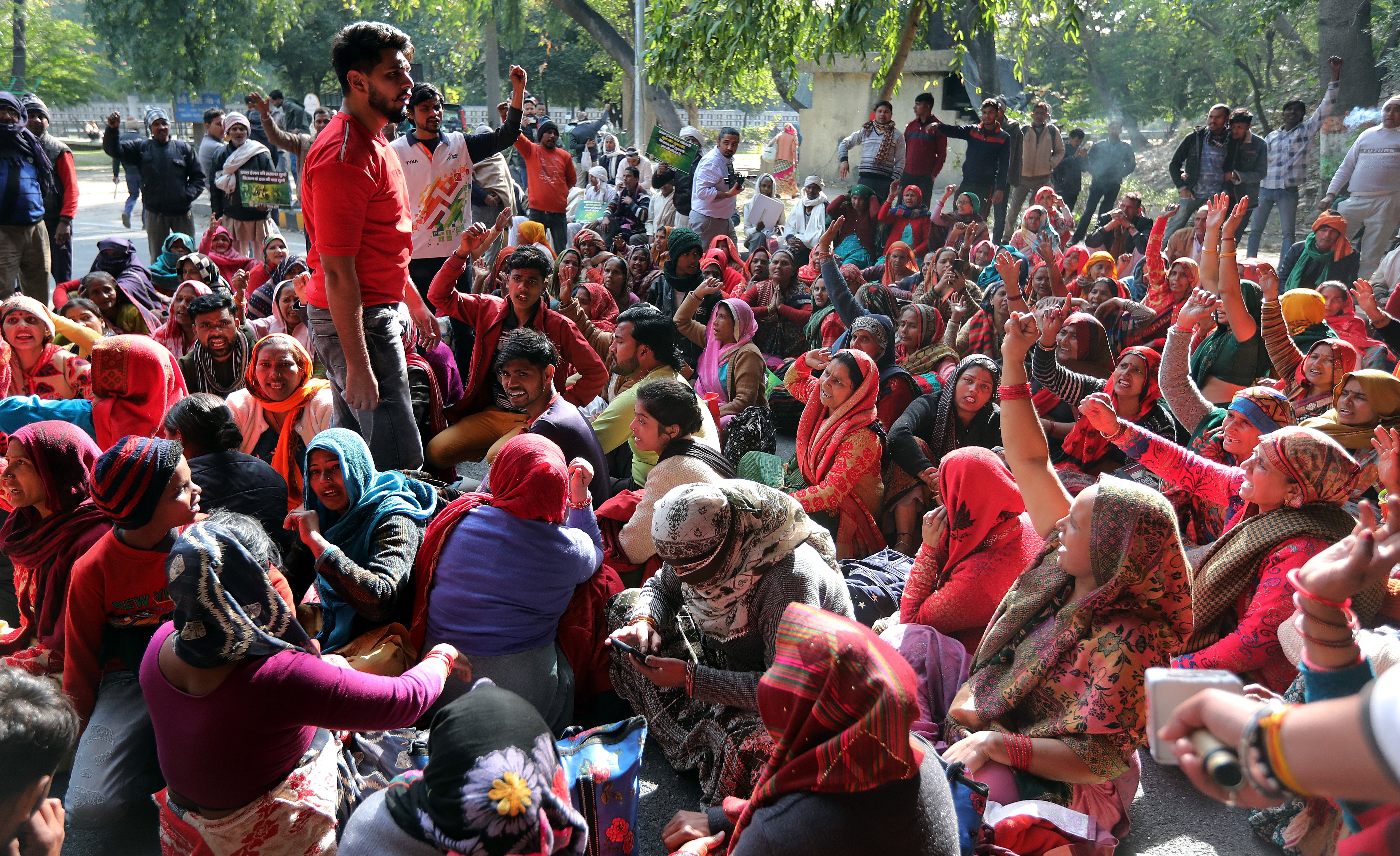 <p>Indian farmers sit on the Delhi link road leading to the Delhi Noida Border as they protest in Delhi Noida Border in Uttar Pradesh, India, 08 February 2024</p>