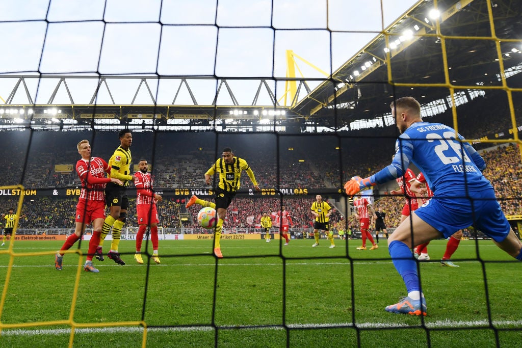 Haller heads in his first Dortmund goal after beating cancer