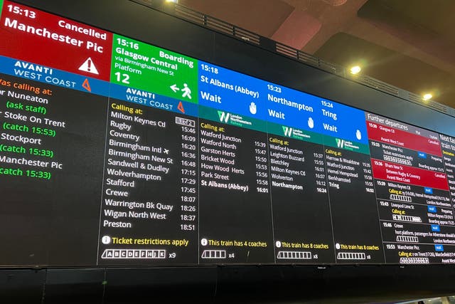 <p>Departure board at London Euston showing cancellations (file photo) </p>