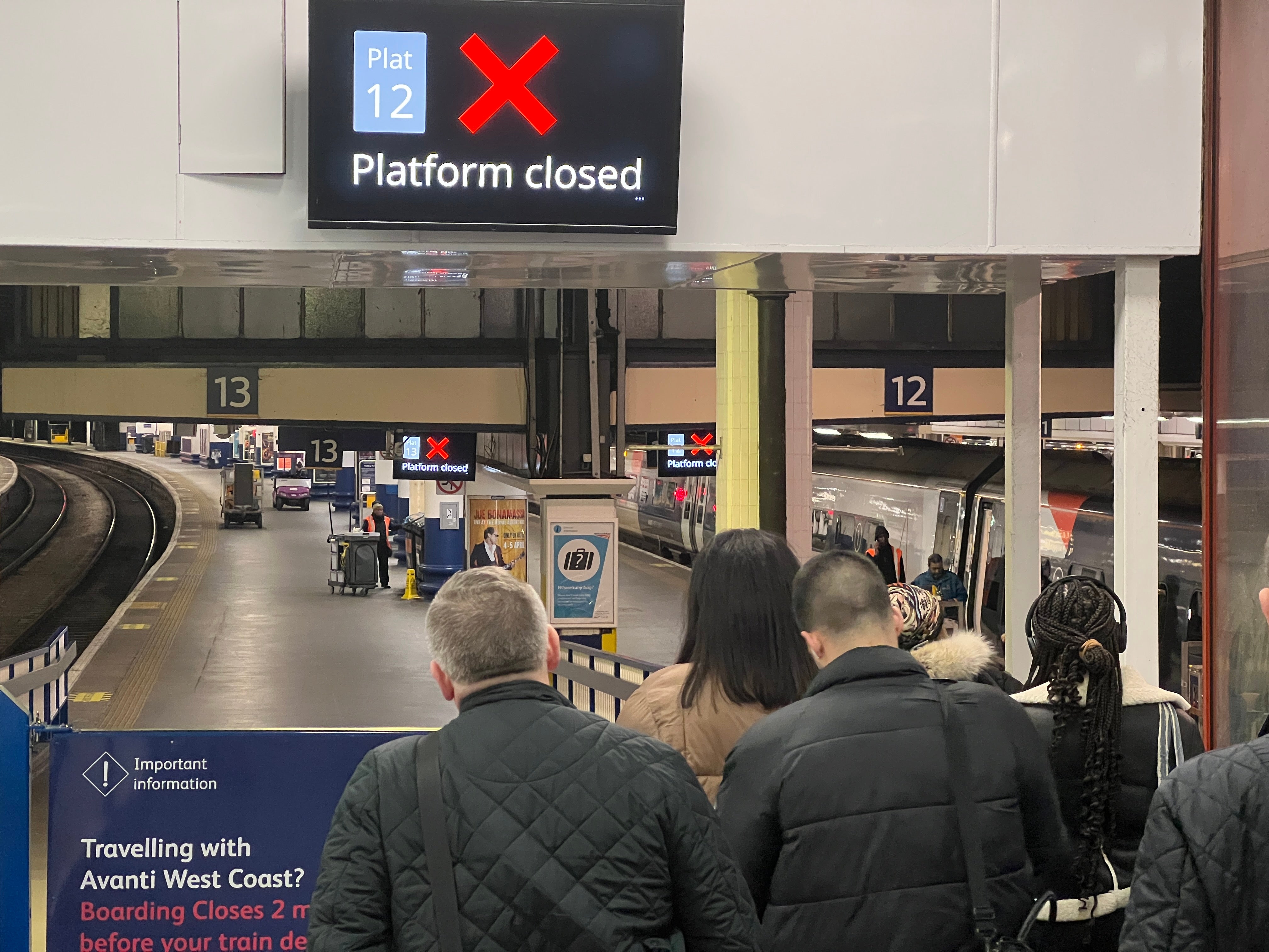 Going places? Passengers at London Euston on Monday night, 12 February, waiting to board the final train to the West Midlands before Network Rail closed the line