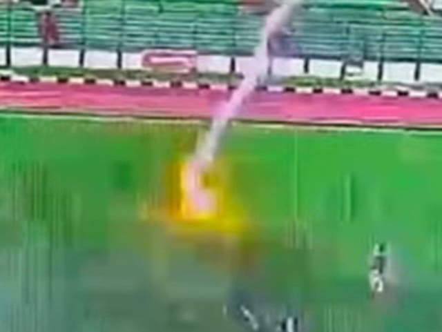 <p>A footballer was struck by lightning during a football match in Indonesia. Screengrab</p>