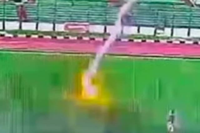 <p>A footballer was struck by lightning during a football match in Indonesia. Screengrab</p>