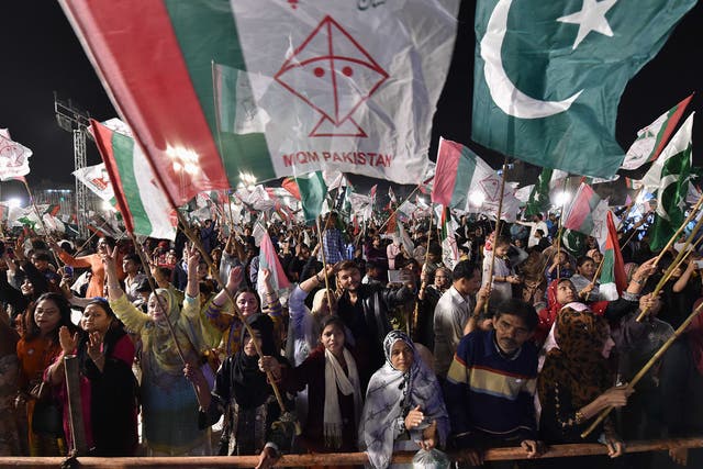 <p>Supporters of the Mutahida Qaumi Movement (MQM) celebrate after election commission of Pakistan announced unofficial preliminary results of general elections in Karachi, Pakistan, 11 February 2024</p>