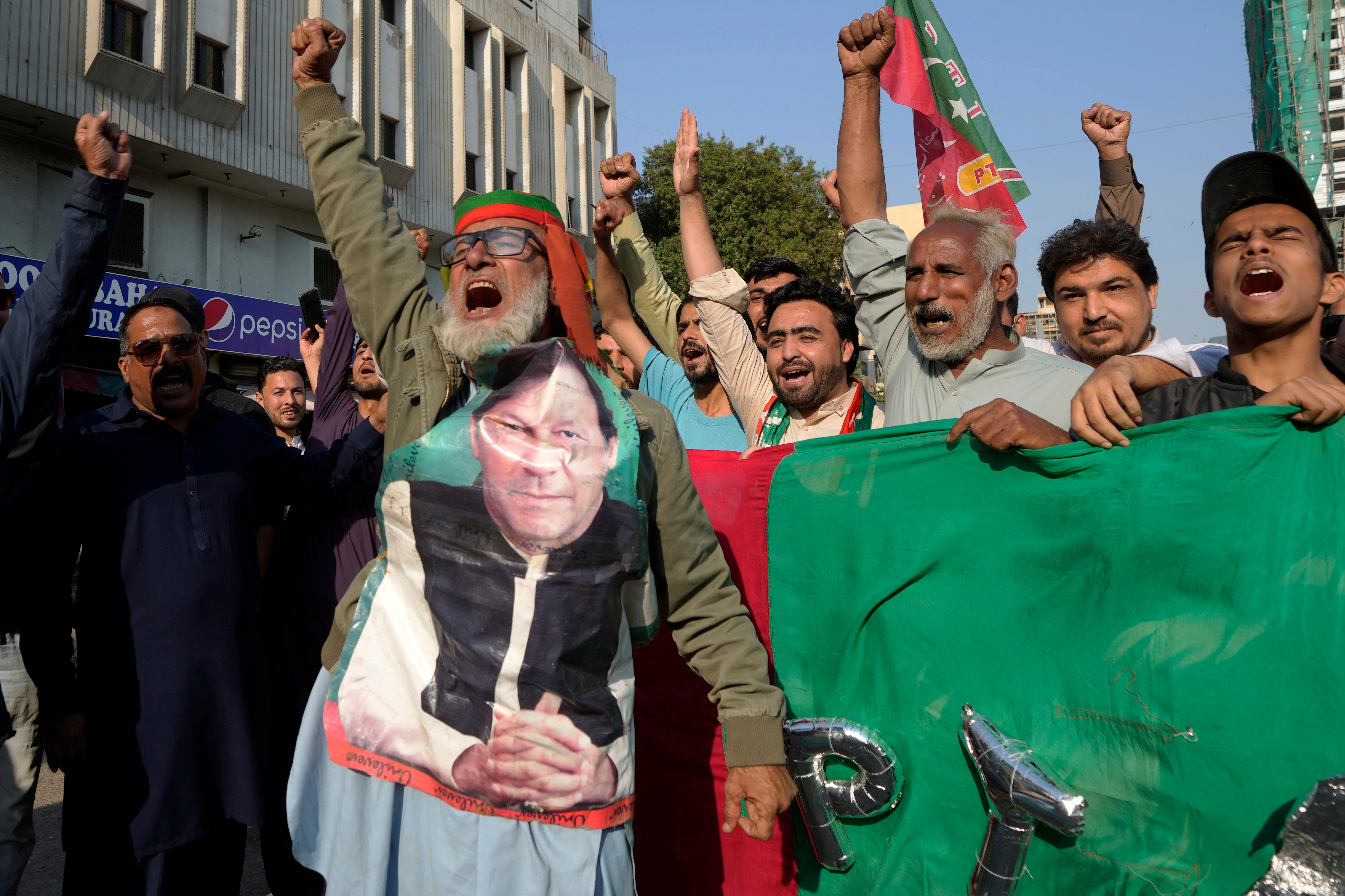 Supporters of Pakistan's Former Prime Minister Imran Khan's party 'Pakistan Tehreek-e-Insaf' chant slogans during a protest against alleged vote-rigging in some constituencies in the parliamentary elections, in Karachi, Pakistan, Sunday, 11 February 2024