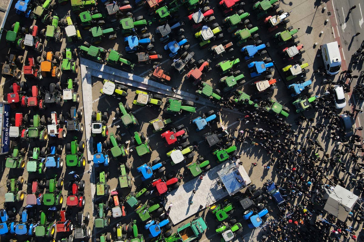 Protesting Greek farmers debate next moves after government offers some concessions