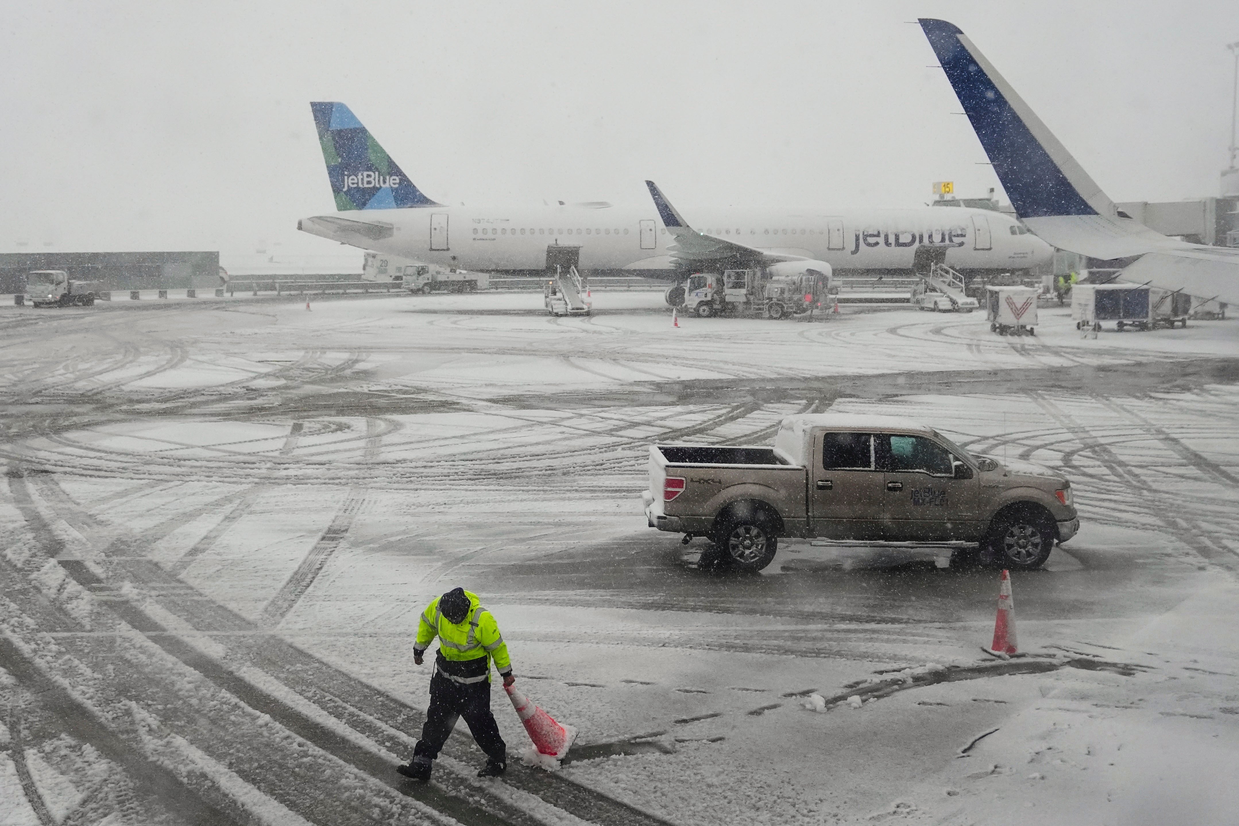 John F Kennedy International Airport, pictured above, has already cancelled 184 flights as of Tuesday morning