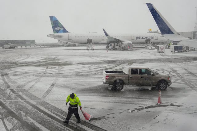 <p>John F Kennedy International Airport, pictured above, has already cancelled 184 flights as of Tuesday morning</p>