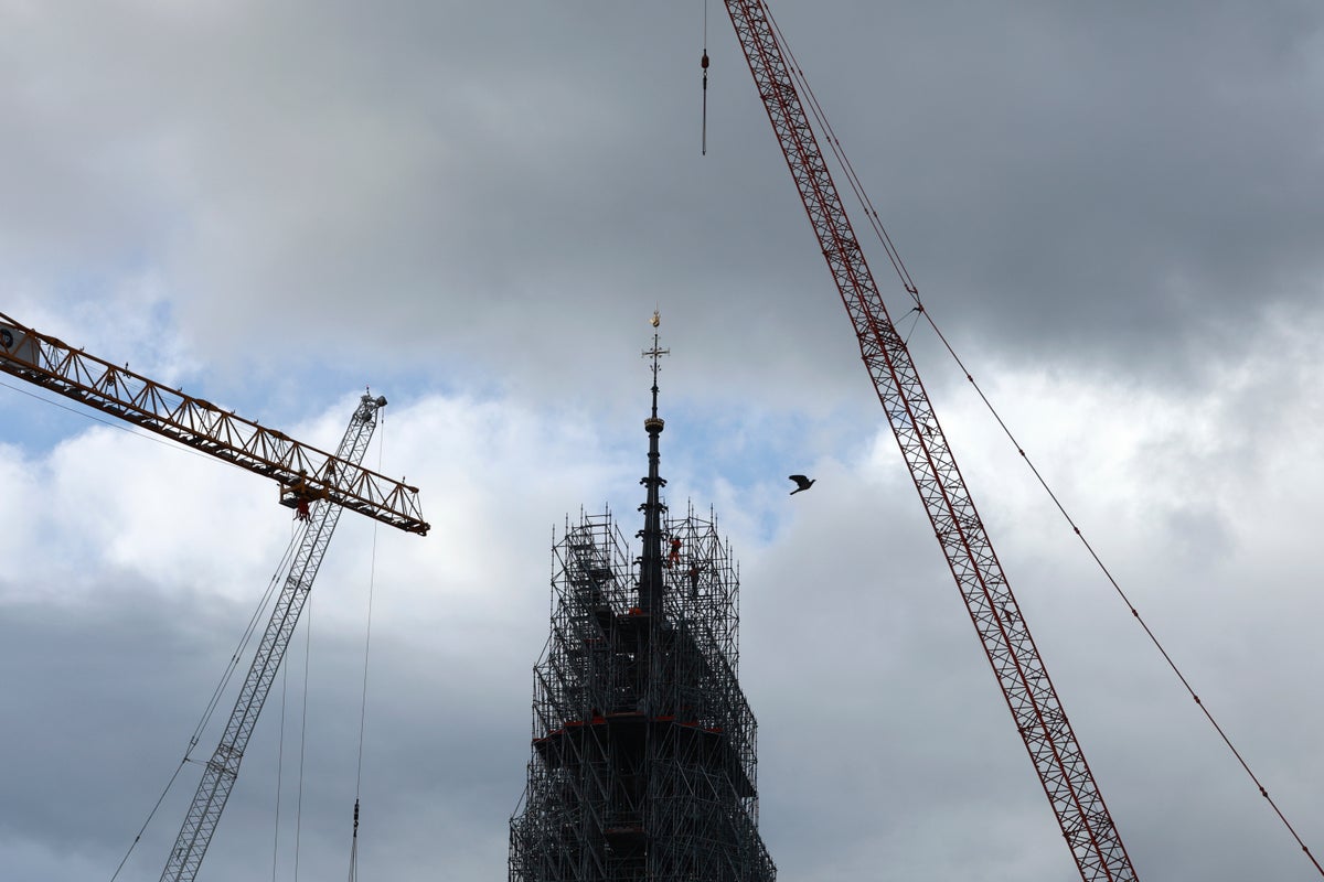 Notre Dame cathedral's spire revealed in Paris as reconstruction continues after fire