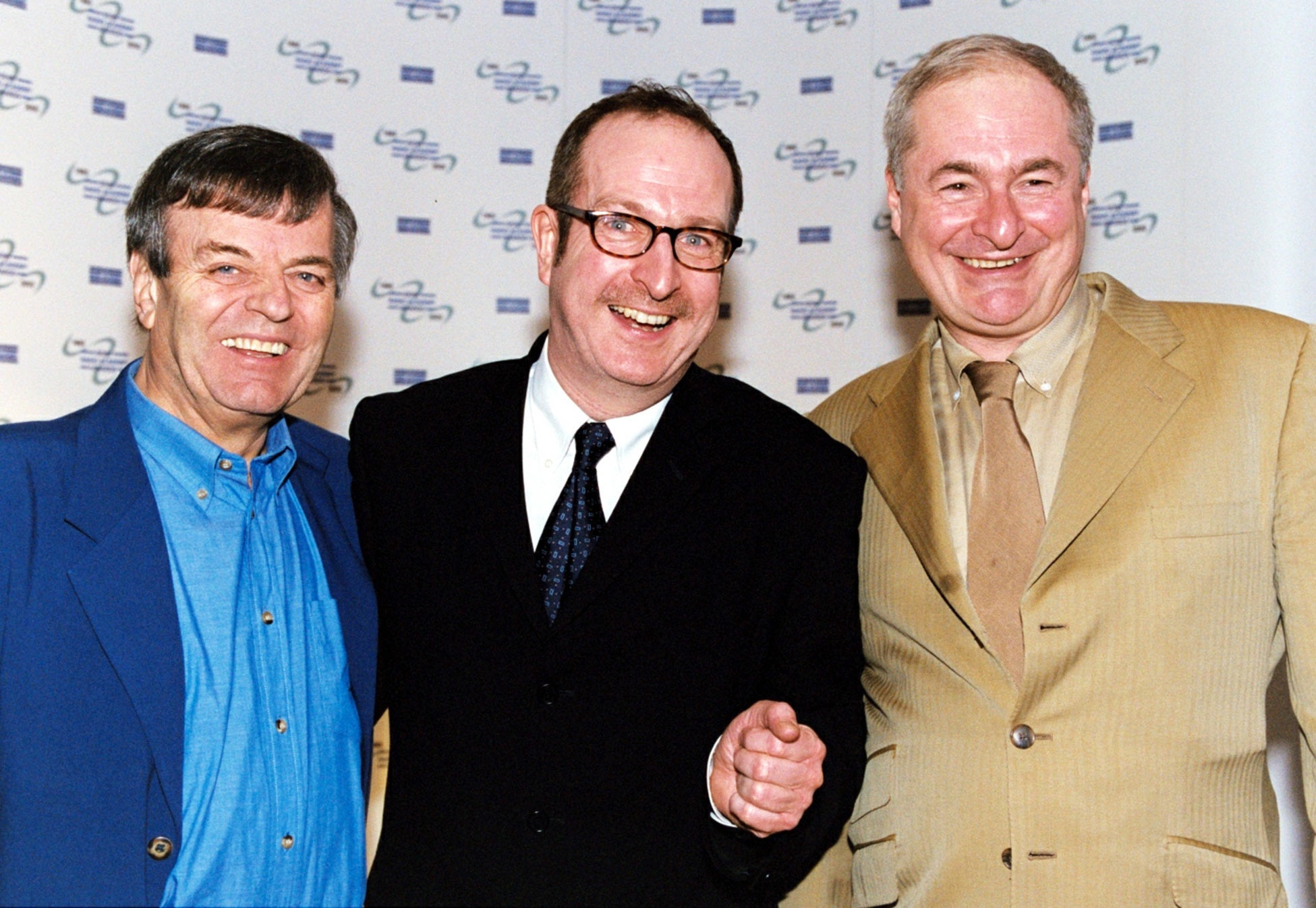 Radio DJs Tony Blackburn (left), Steve Wright and Paul Gambachini (right)
