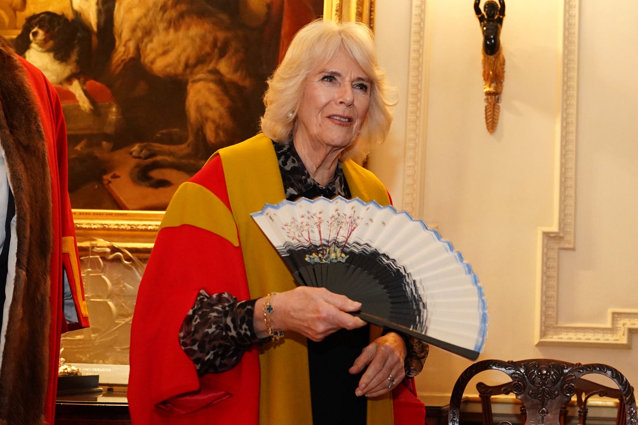 Queen Camilla was presented with a fan designed by Stewart Parvin (Jordan Pettitt/PA)