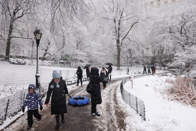 In pictures: New York blanketed in snow after powerful winter storm ...