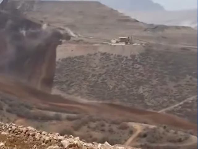 <p>A still from a video shows landslide sweeping across the valley in eastern Turkey</p>